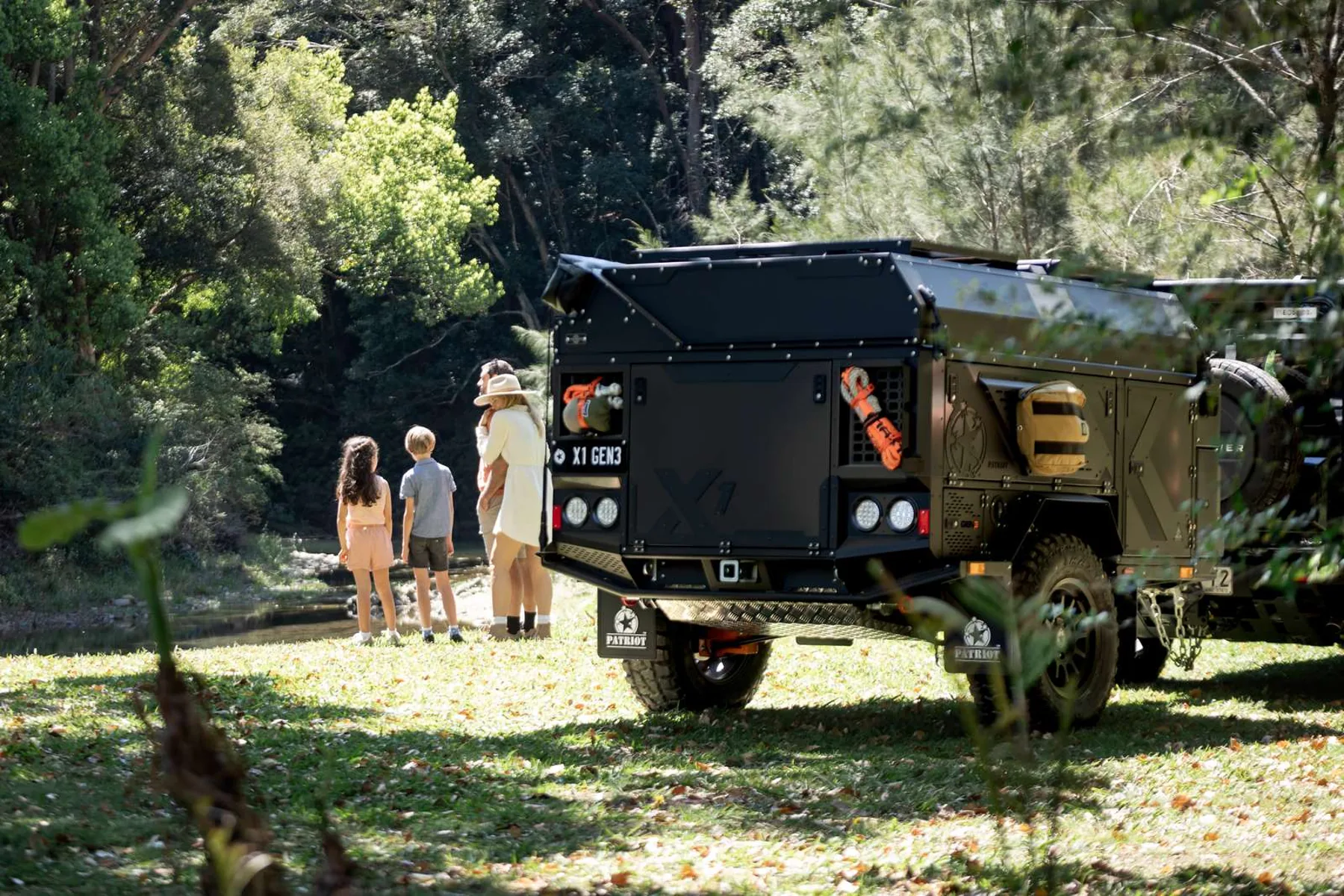 Family arriving at camp