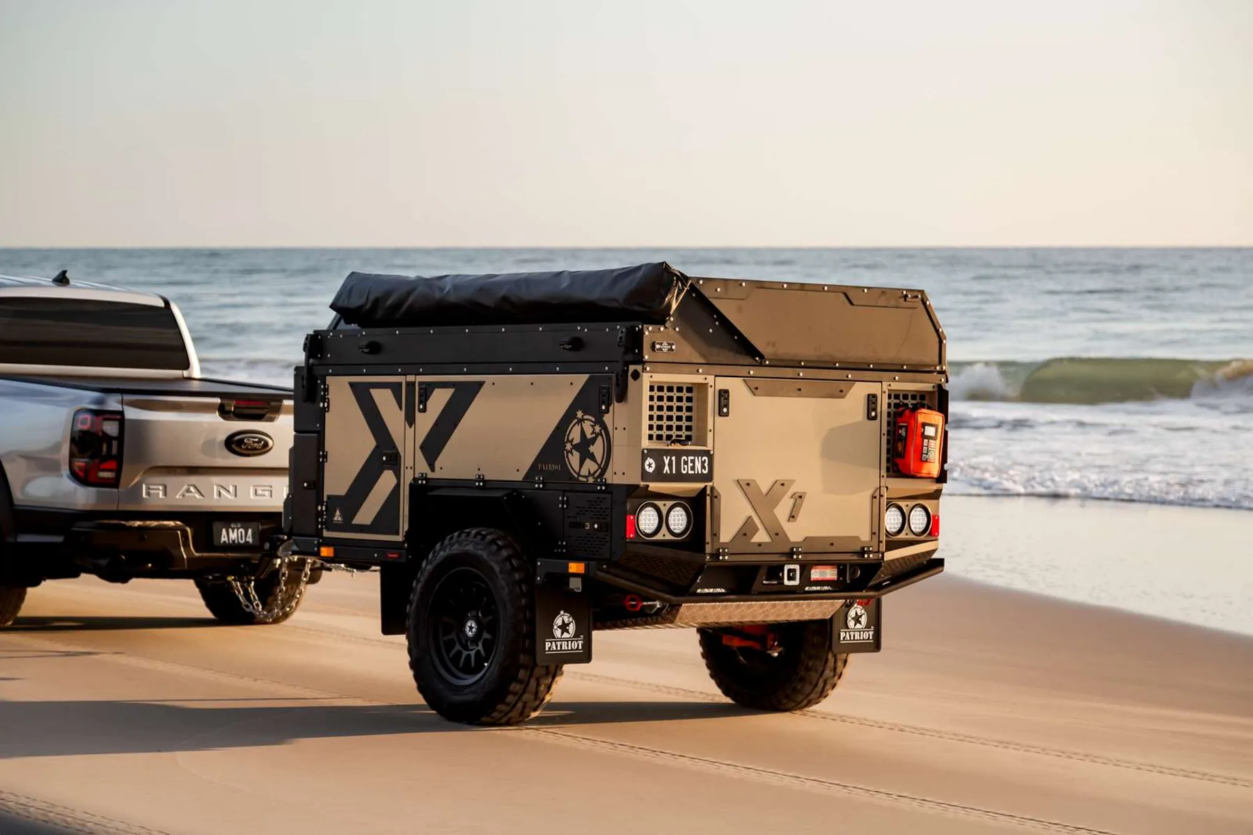 Desert Gen3 X1 being towed along the beach