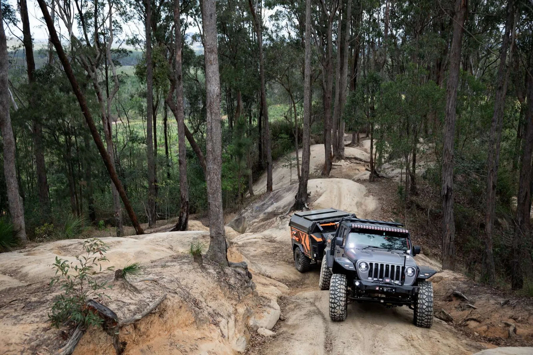 Jeep and Gen3 X1 on rocky terrain
